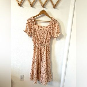 Peach floral dress with scalloped neckline